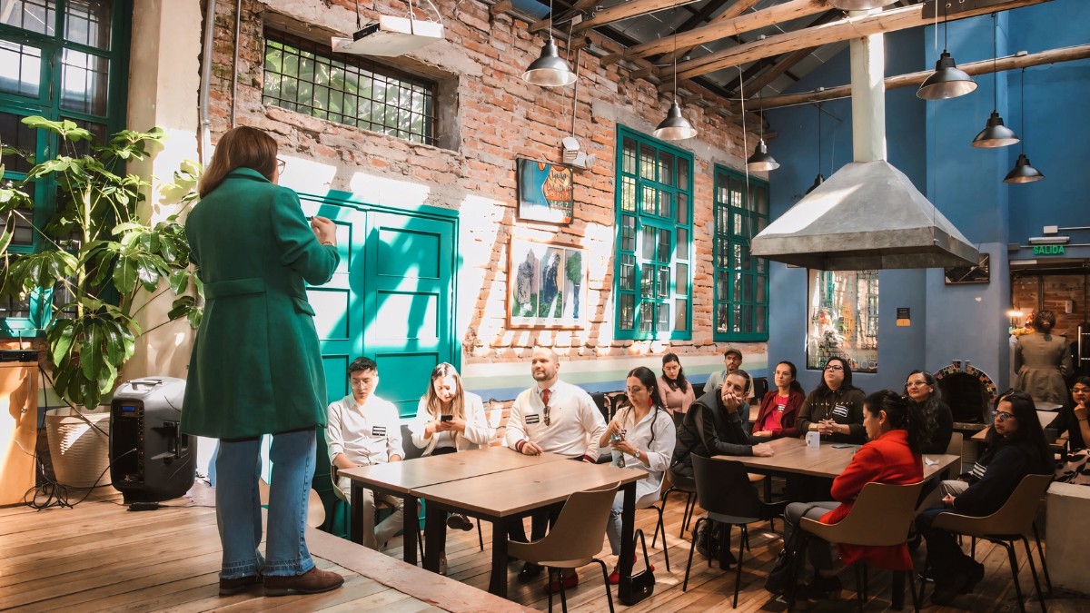 Founder presenting at a Nomad Pioneers community talk and demo event